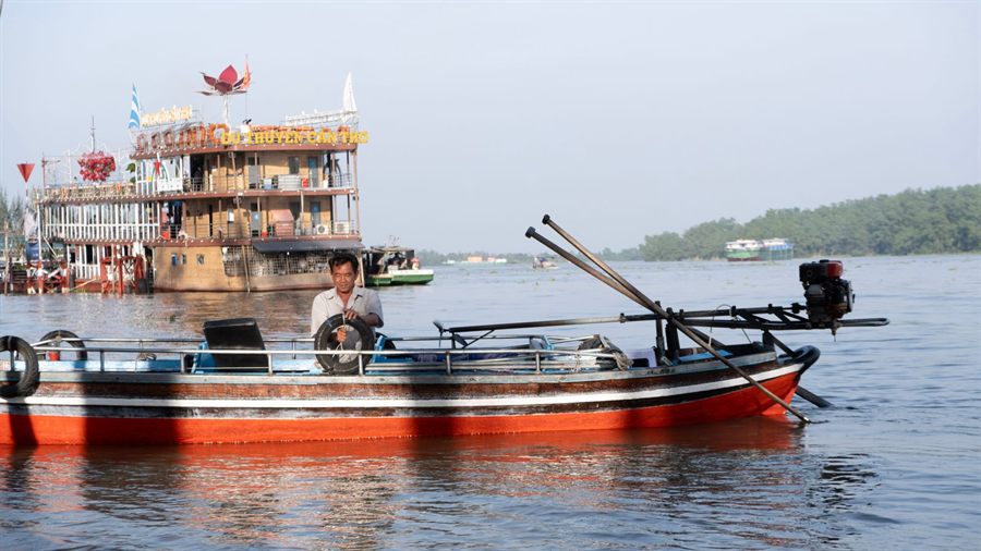 Wooden boat on the Mekong